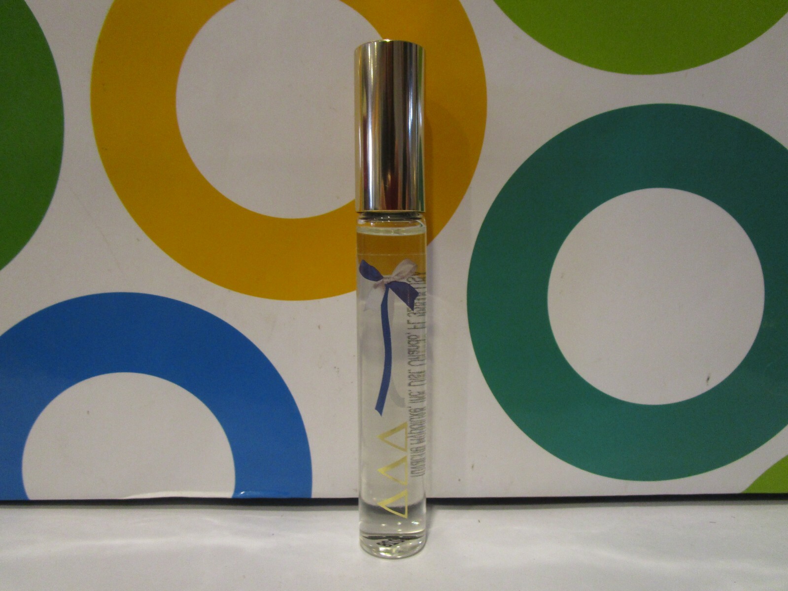 DELTA DELTA DELTA ~ DELTA DELTA DELTA EAU DE PARFUM ROLLERBALL ~ .33 OZ UNBOXED