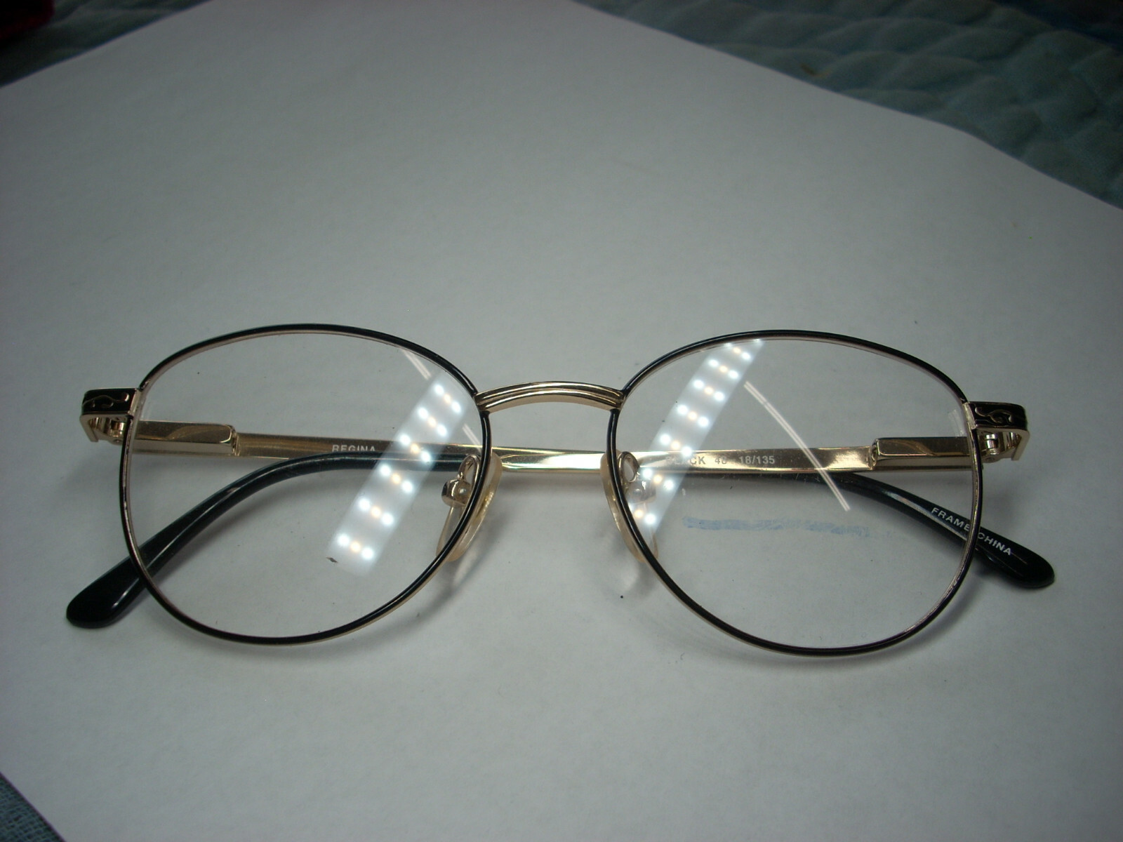 UNKNOWN BRAND “REGINA” WOMEN’S BLACK/ GOLD METAL EYEGLASS FRAMES 48-18-135 (VB)