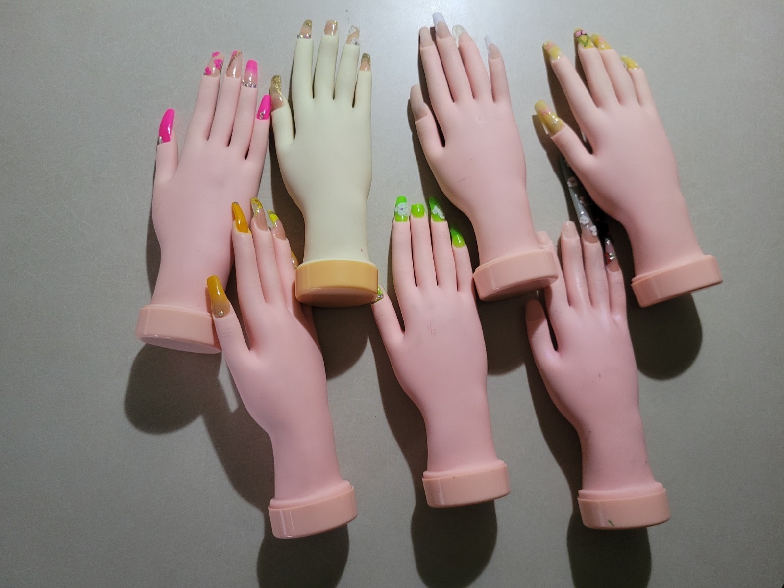 bundle of 7 mannequin hand for nail art practice and display.