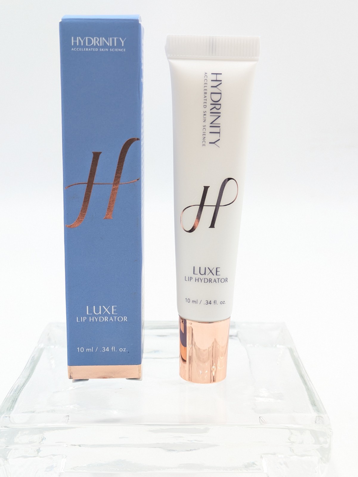 New in box: Hydrinity Luxe Lip Hydrator .34 fl oz 10 ml.