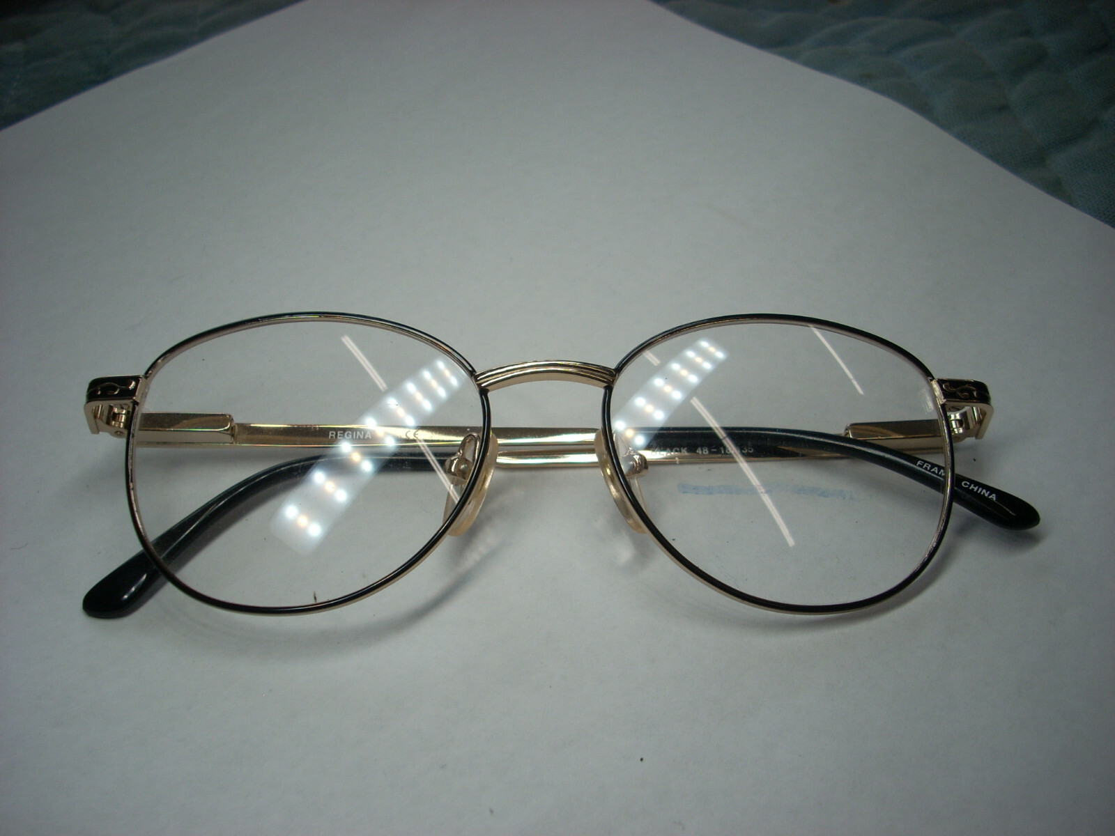 UNKNOWN BRAND “REGINA” WOMEN’S BLACK/ GOLD METAL EYEGLASS FRAMES 48-18-135 (VB)