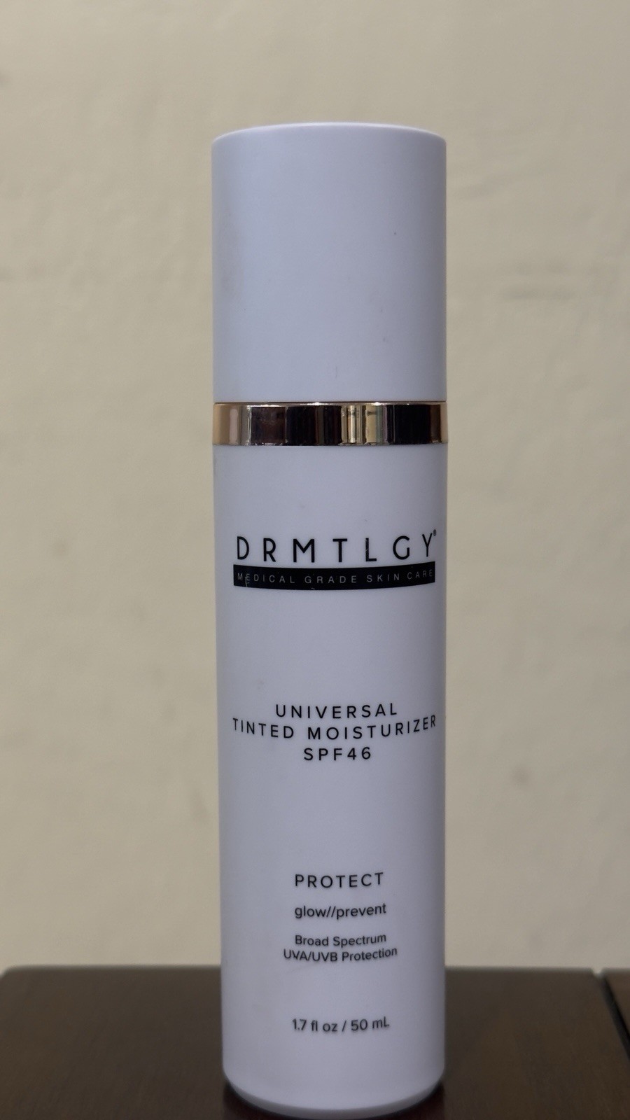 1.7 oz bottle of DRMTLGY Universal Tinted Moisturizer with SPF 46.