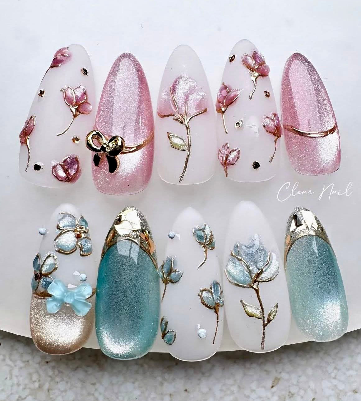 Long Almond Press-On Nails Pink White Blue Glitter Floral Design
