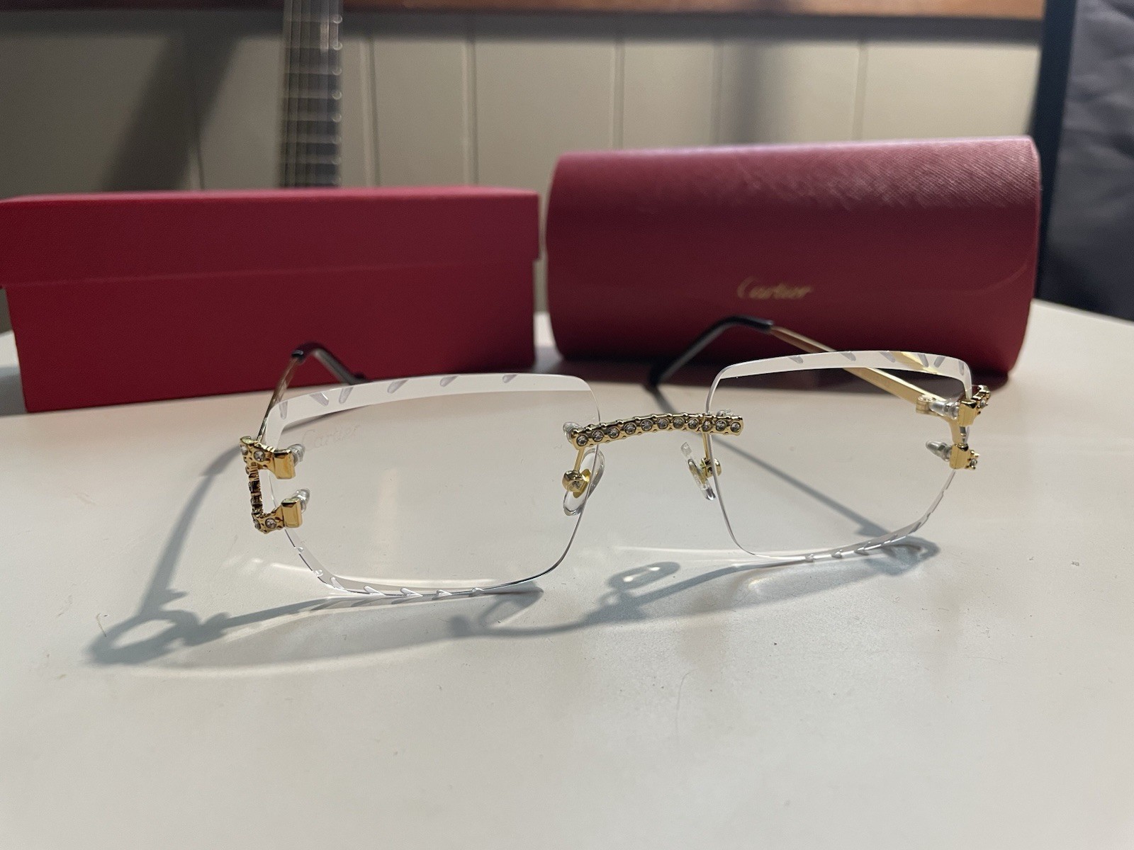 Cartier CT0066O Rimless Rectangular Gold Metal Eyeglass Frames 55-19-140