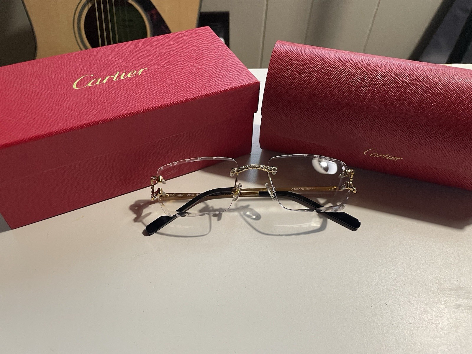 Cartier CT0066O Rimless Rectangular Gold Metal Eyeglass Frames 55-19-140