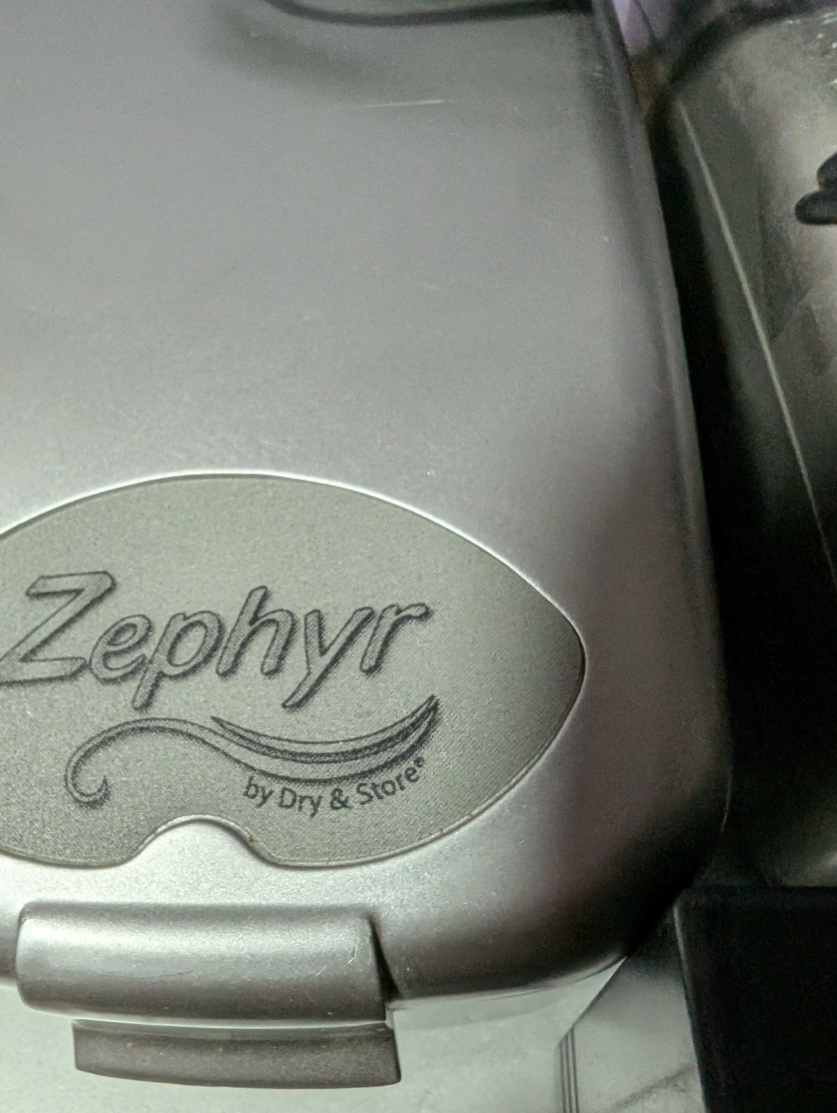 Two Zephyr by Dry & Store, an electronic dehumidifier