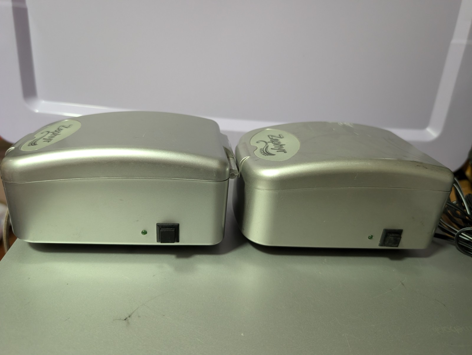 Two Zephyr by Dry & Store, an electronic dehumidifier