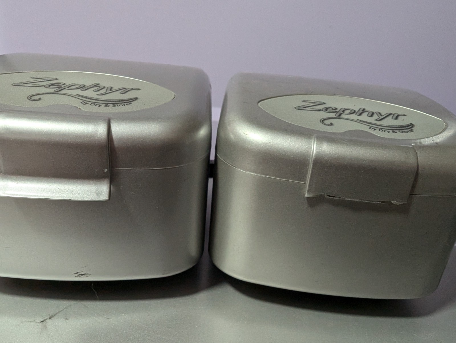Two Zephyr by Dry & Store, an electronic dehumidifier