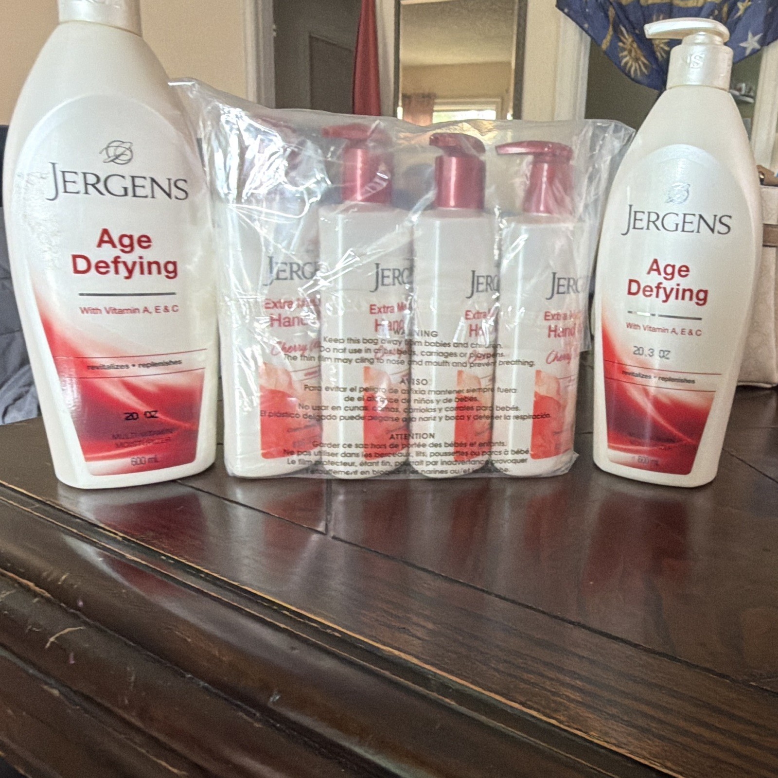 Lot of 6. Jergens Cherry Almond hand soap (4) Age defying lotion (2 for free)