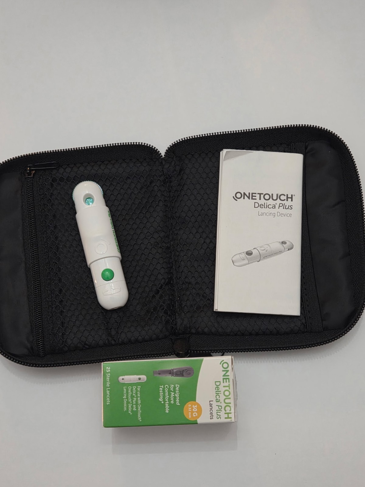 OneTouch Delica Plus Lancing Device + 25 Sterile Lancets + Zippered Case